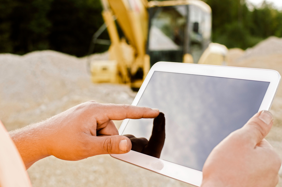 Construction worker with tablet